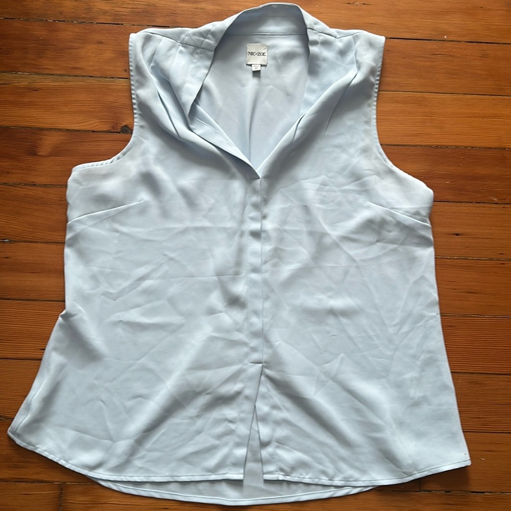 Sleaveless blouse in timeless style size XL